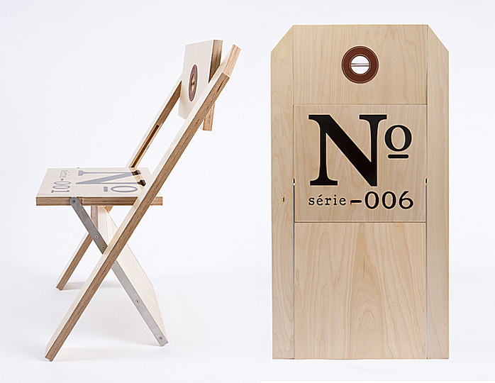 Ateliers Guyon: Chaise pliante dont le premier modèle a été développé pour les Rencontres Internationales du Documentaire de Montréal (RIDM). La chaise peut être personnalisée selon l'événement. Entièrement faite de merisier russe et d'acier inoxydable, elle ne fait qu'un pouce, une fois repliée.