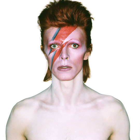 David Bowie is Crossing the Border.: Album cover shoot for Aladdin Sane, 1973
Design by Brian Duffy and Celia Philo, make up by Pierre La Roche
Photograph by Brian Duffy
© The David Bowie Archive and (under license from Chris Duffy) Duffy Archive Limited