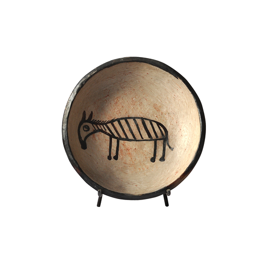 Serve Up!: Donkey pattern plate. Handmade Terra cotta, natural color, pattern painted with vegetal color, Tribal collection. H8 x L34 x P34 cm.  Designer : Zeineb & Salah Sfar Stand name : TINJA. Show : MAISON&OBJET Copyright : Yasmine Sfar