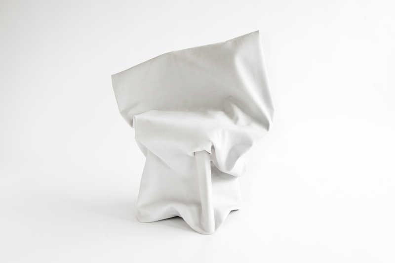 Chairbag: Chairbag is the hybrid result of a crossover between a chair and a beanbag. A sketlleton with loose skin. Shape can be defined to drape its skin over the frame. The leather that has been used are rejected skins from the industry. These ones were too pale...