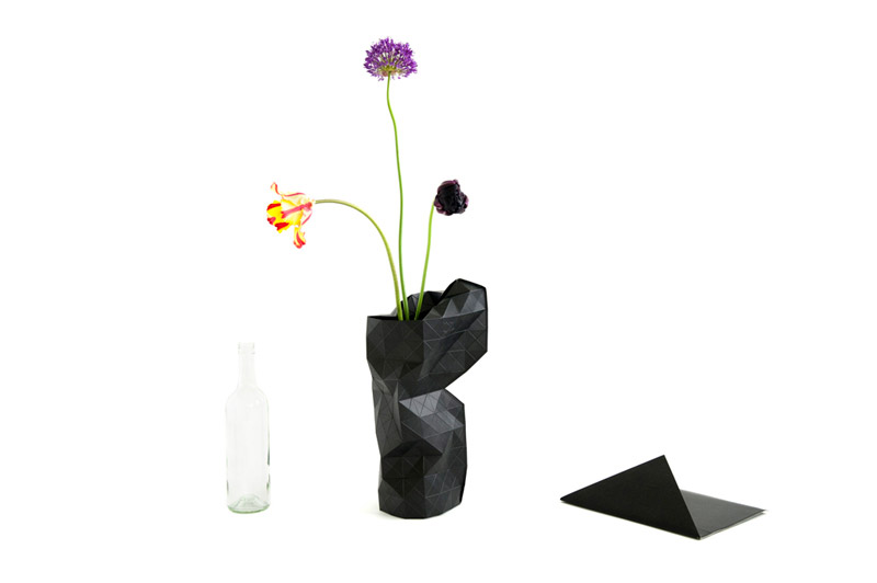 Chairbag: Paper Vase Cover
The Paper Vase is a skin to cover any empty bottle and to turn it into a vase. Adjustable in size by rolling up the paper the vase cover will fit any bottle. The triangular structure allows the paper to set around its bottle. The paper vase comes flatpacked in an envelope.
