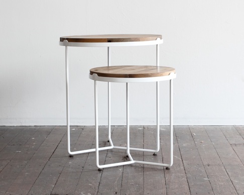 Walk The Plank Collective: here we are working with cold rolled steel rod along with steel plate. the side tables have been finished with carefully selected wood portions reclaimed from fishing vessels. the finish is a natural water-base finish that has been sanded beautifully and fine to create a beautiful touch. the rod has been threaded to fit adjustable feet