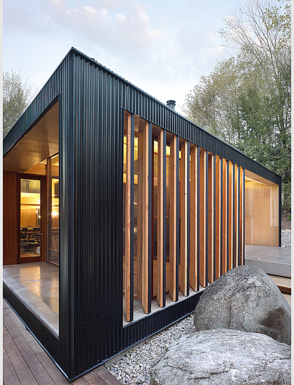 Clear Lake Cottage, Parry Sound, Ontario: A Toronto family of five requested a cottage that is ‘modern and open’ but retains a quintessential ‘cottage feel’. The building was to be commodious and accommodate extended family but should avoid ostentation in scale and modernity.