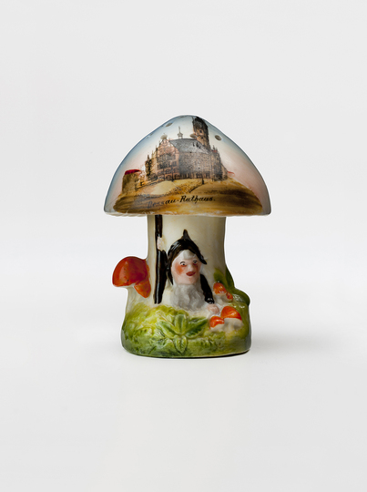 Good Taste? Bad Taste?: This souvenir from Dessau is a salt shaker. Inside the Mushroom stands the miniture of Dessau City Hall. Pazaurek-Sammlung, Landesmuseum Württemberg, Stuttgart.