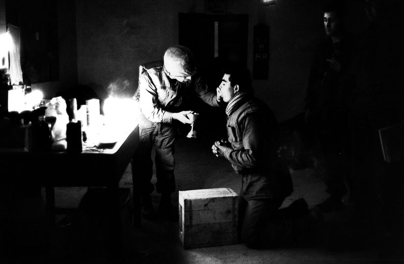 Iconic Photos from the Getty Images gallery: Taking Communion

Marine chaplain Eli Tavesian giving communion to marine Louis A Loya, at Forward Command Post in Hue, Vietnam. (Photo by Express Newspapers/Getty Images)

Terry Fincher