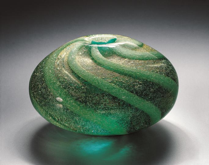 Carlo Scarpa for Venini: Green ovoid sommerso glass vase with gold-leaf inclusions and twisted ribbing on the interior, ca. 1934. Lent by The Steinberg Foundation, Courtesy of The Corning Museum of Glass *Part of the Sommersi series, ca. 1934-36