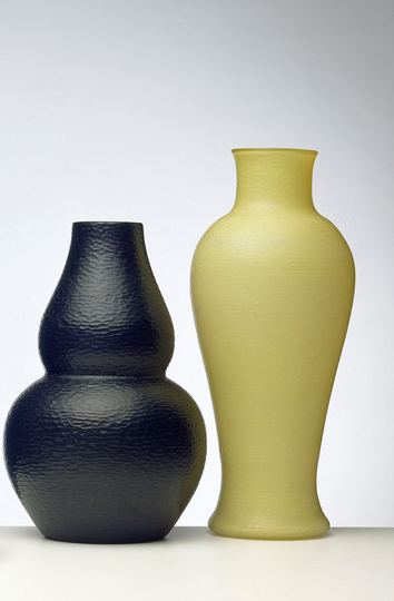 Carlo Scarpa for Venini: Thick black glass vase with battuto finish ca. 1940; Yellow cased glass vase with battuto finish, ca. 1947. Private collection, Treviso *Part of the Battuti series, ca. 1936-45