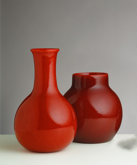 Carlo Scarpa for Venini: Red lacquered glass vase, ca. 1940, and Red lacquered glass vase, ca. 1942. Both in private collections *Part of the Laccati neri e rossi series, ca. 1940