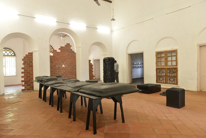 Kochi Biennale 2014: Bijoy Jain's 'Tar Studies' at CSI Bungalow, Fort Kochi. The work on display is composed of a number of ambiguous forms encased in tar.