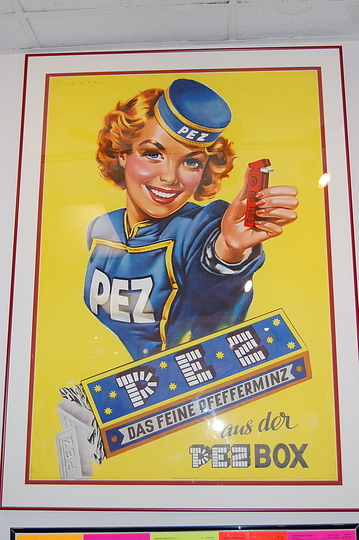 Everyday Design Classics of the 20th Century: PEZ ad poster. Because of the large number of dispenser designs over the years, they have become cult objects and are collected by enthusiasts.