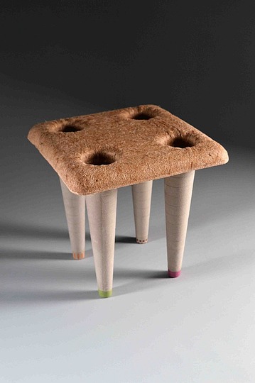 New chairs: Myung Chul Kim, Composite Stool:Made from natural fibers (hemp, jute) injected with polypropylene needles. the sheet could be heated and pressed to take a rigid shape. Textile paper cones are pressure fitted onto the stool top to make the legs.