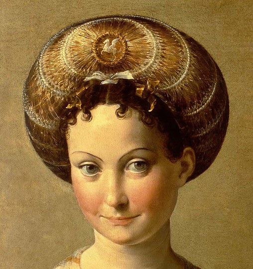 Parmigianino: Schiava Turca: In the early eighteenth century, when the portrait was in the collection of the Uffizi Gallery, the style of the woman’s costume inspired a cataloguer to invent the title “Turkish Slave” by which she has since been known. He likely mistook her headdress for a turban, associated her feather fan with the exotic East, and interpreted the small gold chain tucked into the slashes of her right sleeve as a reference to captivity. Her costume, however, is not Turkish, and is certainly not that of a slave. Her sumptuous garments of silk, accessories of gold, and a fan made from imported feathers and ivory reveal her elite social status. Her turban-like headdress, called a balzo, was worn by Italian Renaissance women of high standing and identifies her as a member of the Northern Italian courts. If this painting was a depiction of an actual person, the historians carefully estimate that it could have been Veronica Gambara, an accomplished poetess at the time