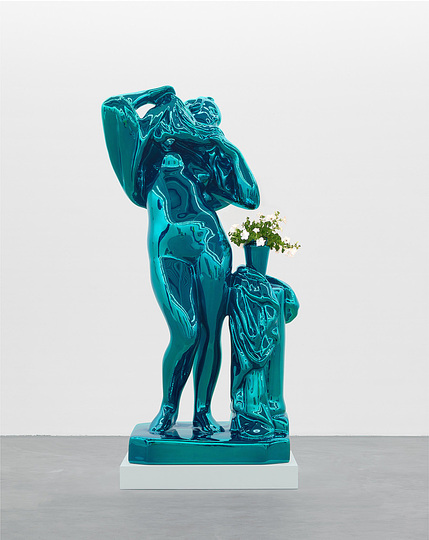 Jeff Koons at the Whitney: Metallic Venus, 2010-12, mirror-polished stainless steel with transparent color coating and live flowering plants, 254 x 132.1 x 101.6 cm. Private collect; courtesy of Fundación Almine y Bernard Ruiz-Picasso para el Arte.