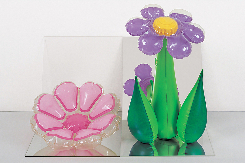 Jeff Koons at the Whitney: Inflatable Flowers (Short Pink, Tall Purple), 1979, Vinyl, mirrors and acrylic, 40.6 x 63.5 x 45.7 cm. Collection Norman and Norah Stone.