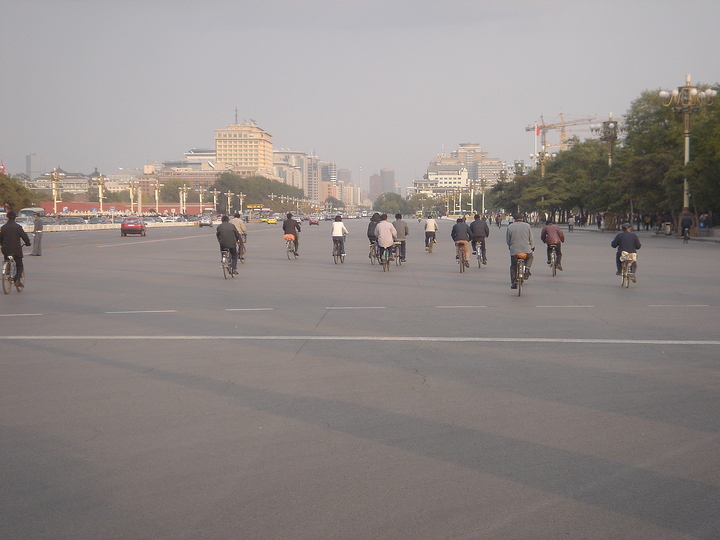 Non-place, Space between: From ceremonial space to car space: Chang-An road in 2004. Chang-An road in Beijing, China, passes Tienanmen square, Forbidden City, the Chinese Parliament and the headquarters of the Communist party. Designed as a street for parades, it was until recently mainly used by bikes. It is now choked by car traffic.