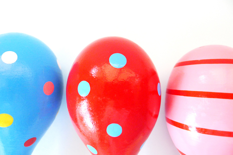 Low Tech can be smart and fun: These maracas work by way of dried seeds encased in a dried fruit shell. They are attached to wooden handles and painted in fun colors.