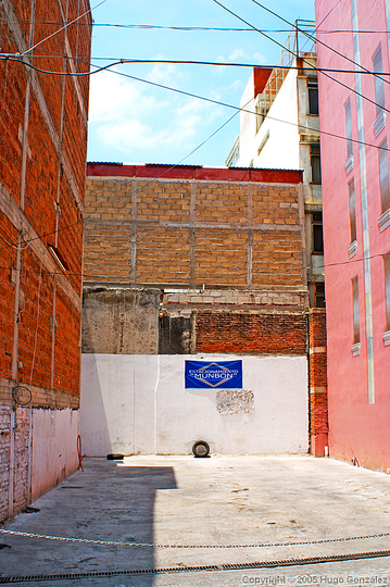 Non-place, Space between: Between space: Space between buildings, perhaps waiting  until the economy recovers to become a new building. Chinatown, San Francisco.